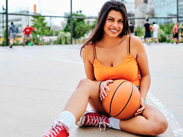 Air Jordan 1, Young girl sitting with a basketball